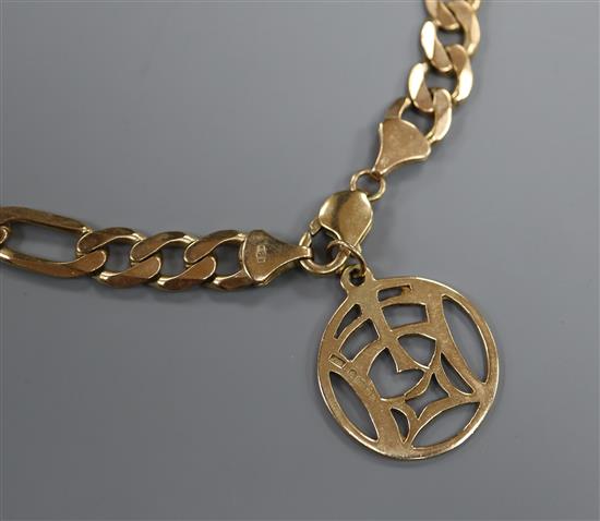 A 9ct gold flattened curblink necklace with pierced pendant drop